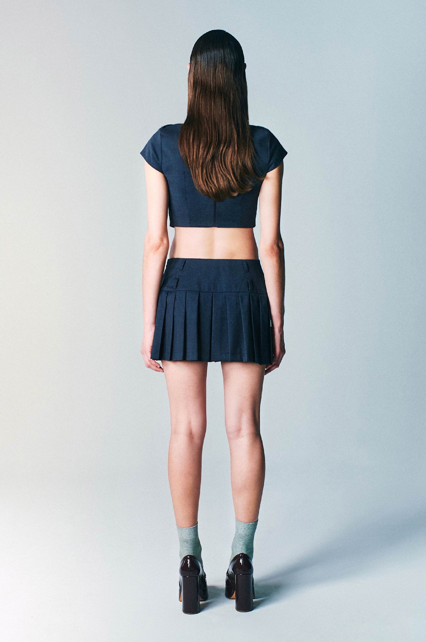 DUA PLEAT MINI SKIRT